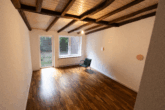 Stadtwohnung mit Charme - Wohnen auf mehreren Ebenen! - Wohnzimmer