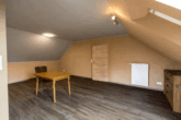 Top gepflegte Oberwohnung mit Terrasse und Gartenanteil in zentraler Lage von Warsingsfehn - Wohnbereich