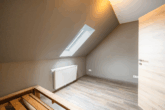 Top gepflegte Oberwohnung mit Terrasse und Gartenanteil in zentraler Lage von Warsingsfehn - Schlafzimmer