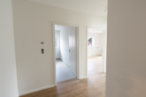 Helle 2-Zimmer-Obergeschosswohnung – Neubau in Top-Zentrumslage - Blick in die Wohnung
