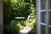 Besondere Lage am Kutterhafen – Ferienhaus mit Hafen- und Weitblick über das Weltnaturerbe Wattenmeer - Blick in den Garten