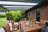 Ländlicher Wohntraum mit Top-Infrastruktur: Familienfreundliches Einfamilienhaus mit großem Garten - überdachte Terrasse (von der Küche aus zugänglich)