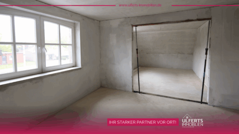 Moderne Dachgeschosswohnung in zentraler Wohnlage von Warsingsfehn, 26802 Moormerland, Apartment