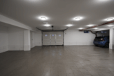 Exklusive Wohnlage - 3-Zimmerwohnung in einer Villa im 1. Obergeschoss mit Tiefgaragen-Stellplatz - Tiefgarage