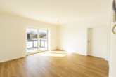 Lichtdurchflutete 3-Zimmer-Dachgeschosswohnung – Neubau in Top-Zentrumslage - Wohnraum