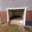 Zentralgelegene Garage, in Realschul-Nähe zu vermieten - Garage, geöffnetes Tor