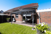 Attraktive Kapitalanlage: Gepflegtes 4-Parteienhaus in ansprechender Lage von Moormerland-Oldersum - WE EG links: Terrasse mit Gartenanteil